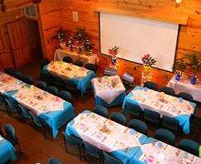 Rigmor House main room with tables and screen